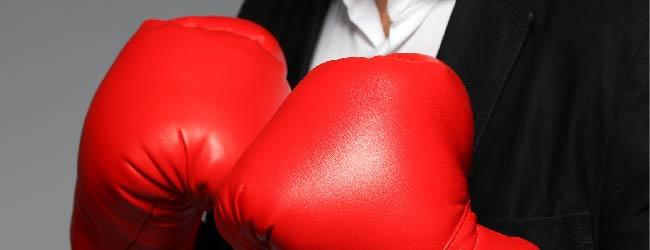 Abbildung: Mann mit Boxhandschuhen