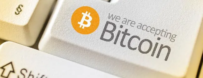 Abbildung: Tastatur mit Aufschrift we are accepting Bitcoin